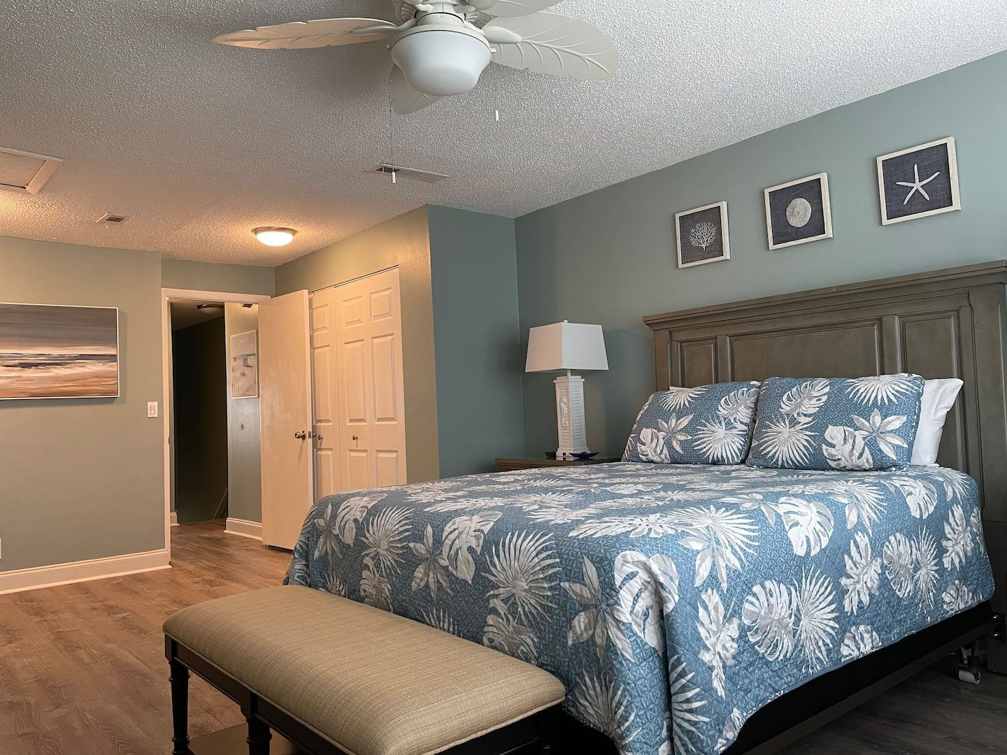 Primary bedroom with king bed at Beach Therapy F-16