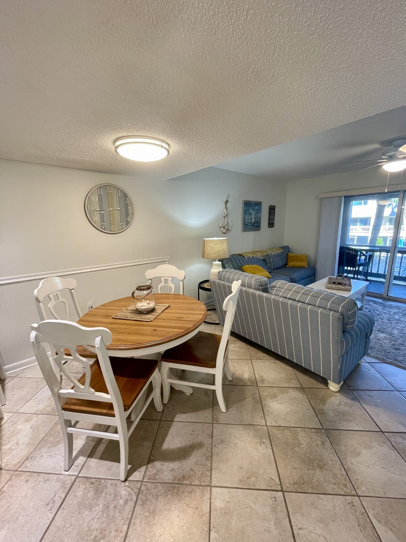 Dining table and living room at Life’s a Beach